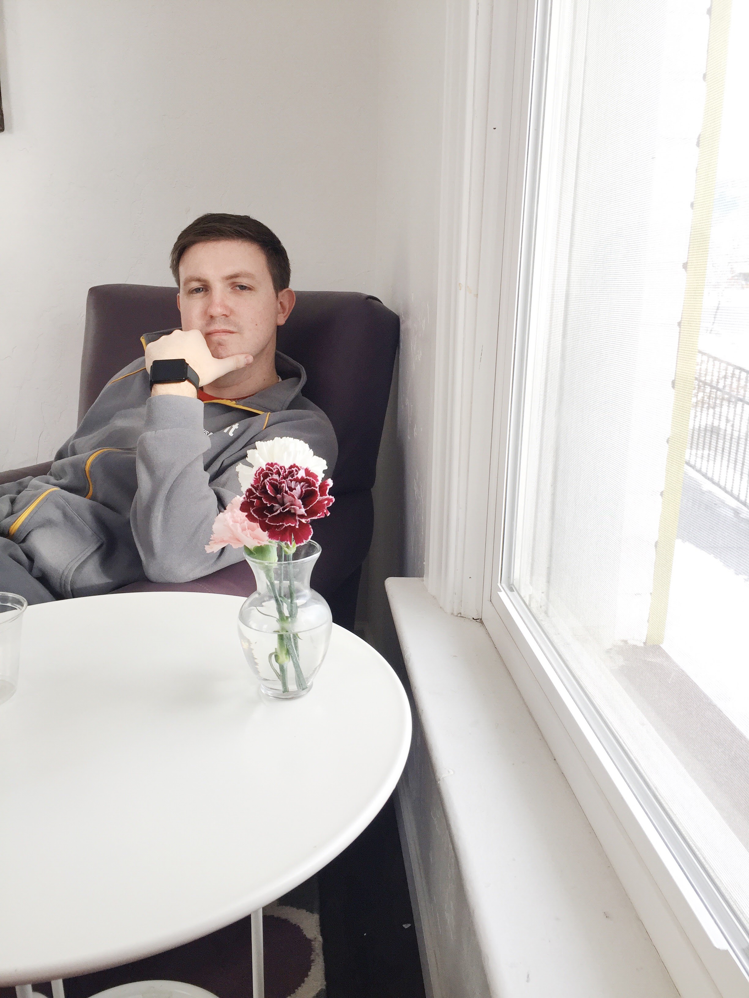 pensively looking at flowers