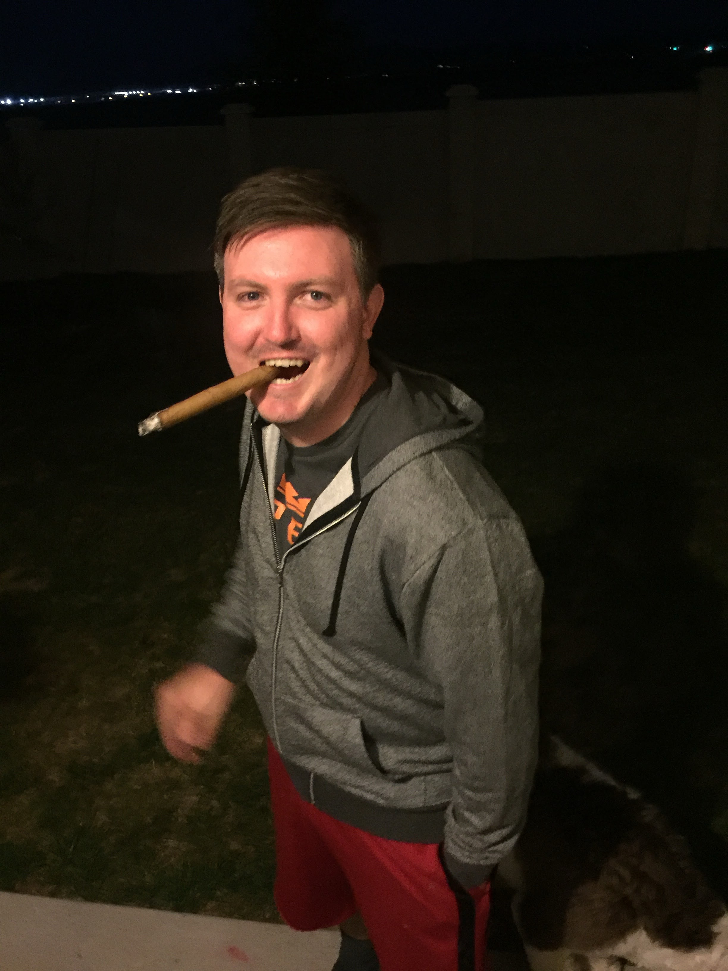 Me smiling with a cigar in my mouth 